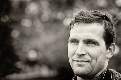 Close-up of young man looking away