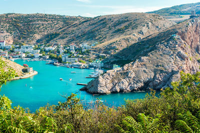 High angle view of city by sea