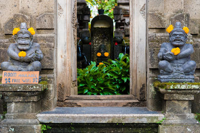 Statue of buddha outside building