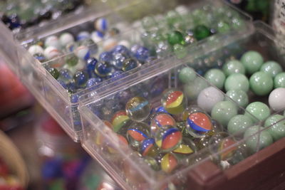 High angle view of candies in glass container