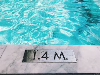 High angle view of text on swimming pool