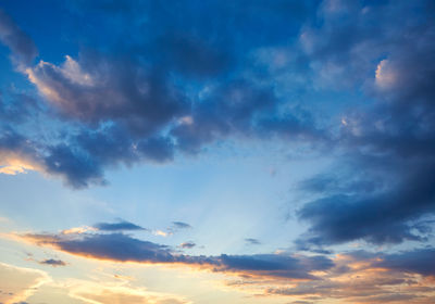 Low angle view of dramatic sky during sunset