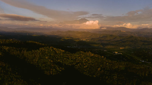 Scenic view of landscape against sky during sunset