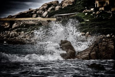 Waves splashing on rocks