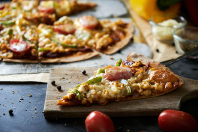 Close-up of pizza on cutting board