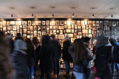 People in illuminated room