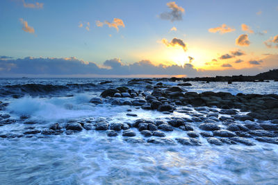 Scenic view of sea against sky during sunset