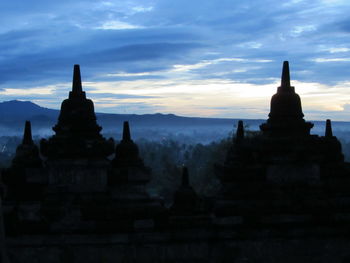 View of temple against cloudy sky