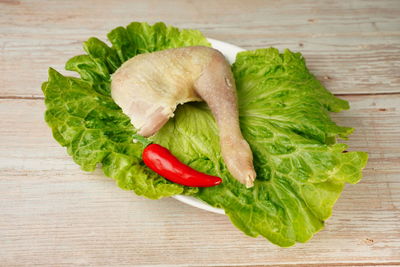 High angle view of vegetables on cutting board