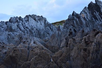 Scenic view of rocks against sky