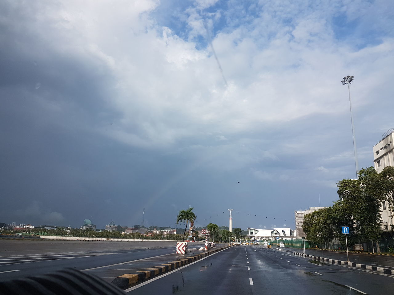 ROAD IN CITY AGAINST SKY