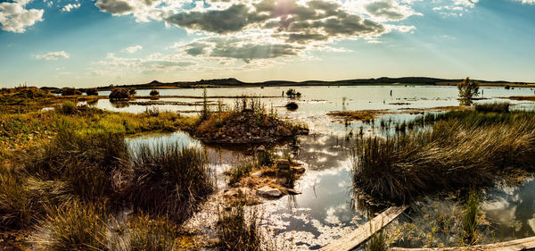 Scenic view of lake against sky