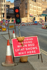 Information sign on street in city