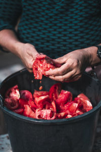 Midsection of man preparing food