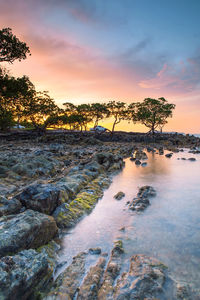 Scenic view of sea against sky during sunset