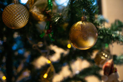 Close-up of christmas decoration hanging on tree