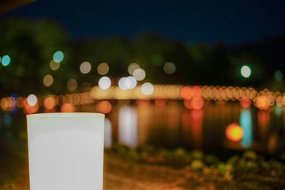 Close-up of illuminated lights at night