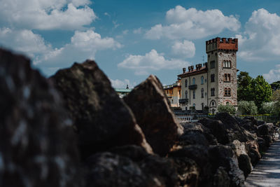 Buildings in city against sky