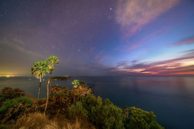 Scenic view of sea against sky at night