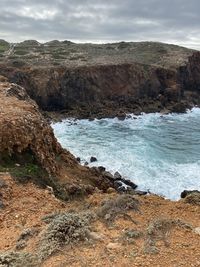 Scenic view of beach against sky