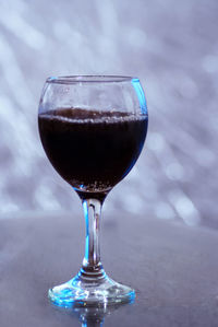 Close-up of beer glass on table