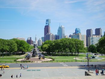 George washington monument at eakins oval with urban skyline in background
