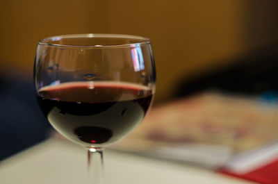 Close-up of wineglass on table