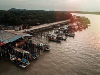 High angle view of boats in sea against sky