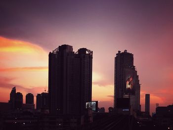 Cityscape against sky during sunset