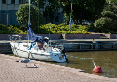 View of boat moored at riverbank