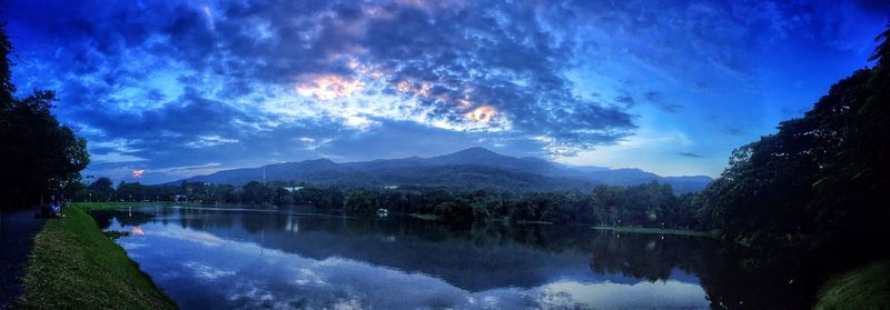 Panoramic shot of calm lake against mountain range