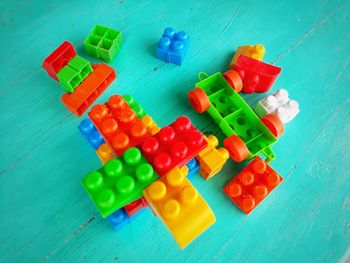 High angle view of toys on wooden table