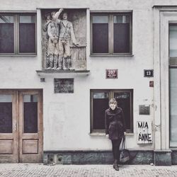 Full length of man with umbrella