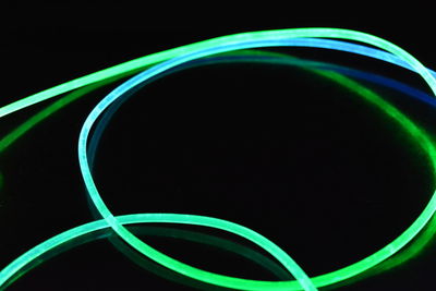 Close-up of light painting against black background