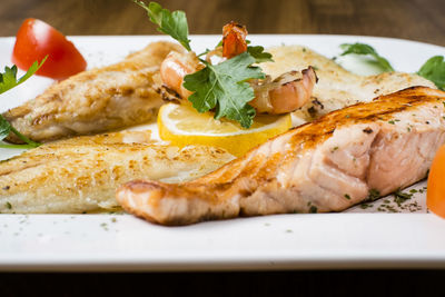 Close-up of fish served in plate on table