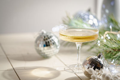 Close-up of wineglass on table