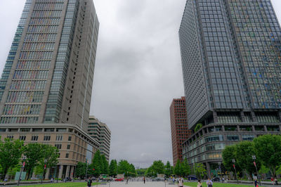 Low angle view of modern buildings against sky