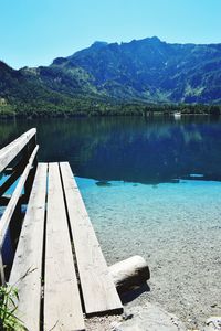 Scenic view of lake against blue sky