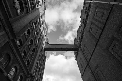 Low angle view of buildings in city against sky