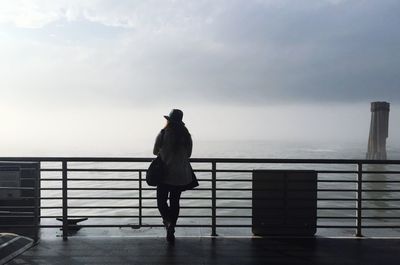 People standing on jetty