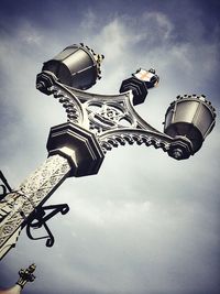 Low angle view of ferris wheel against sky
