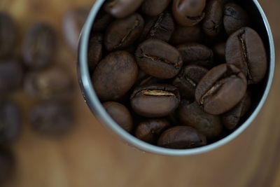 High angle view of coffee beans in bowl