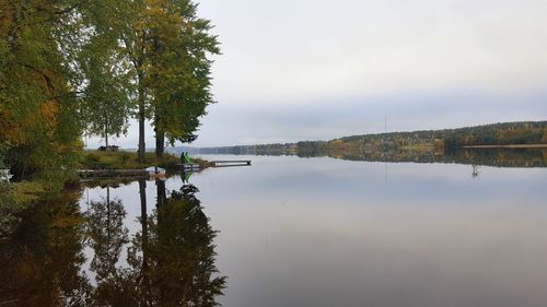 Reflection of trees in lake