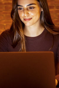 Young woman using laptop