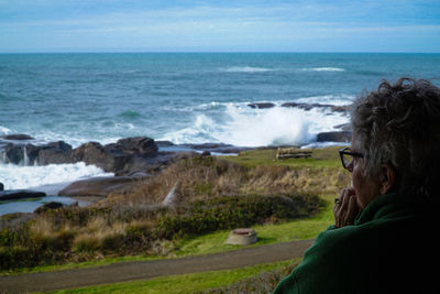 Senior woman looking at sea