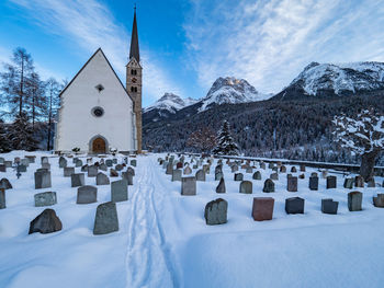 Panoramic view of temple against sky during winter