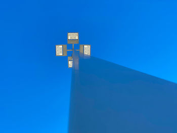 Low angle view of building against blue sky