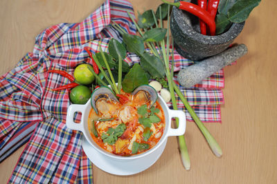 High angle view of vegetables in bowl on table