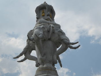 Low angle view of statue against sky