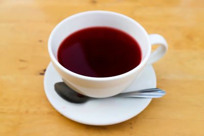 High angle view of coffee cup on table